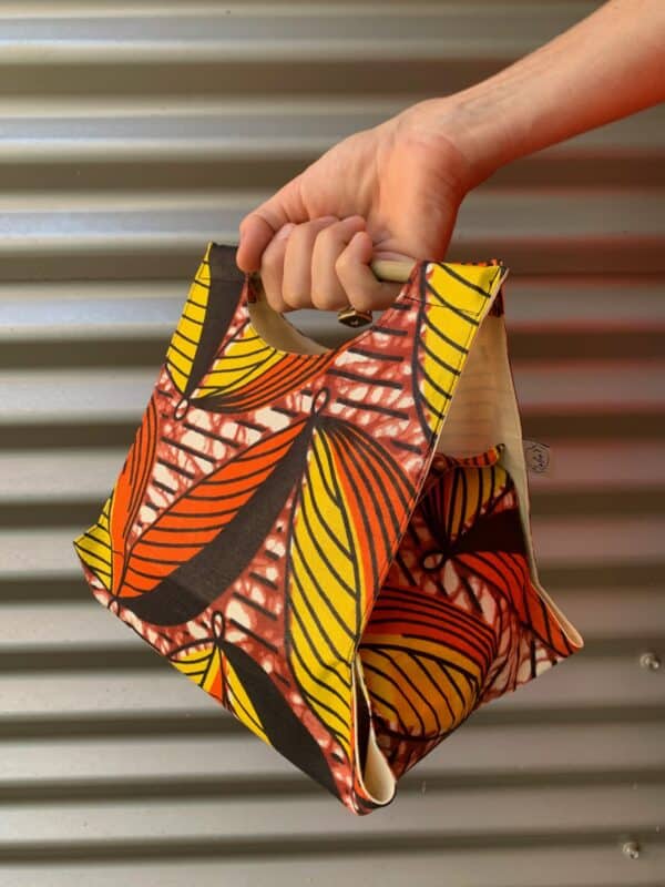 Sac de transort avec set de table intégré - Wax orange et jaune